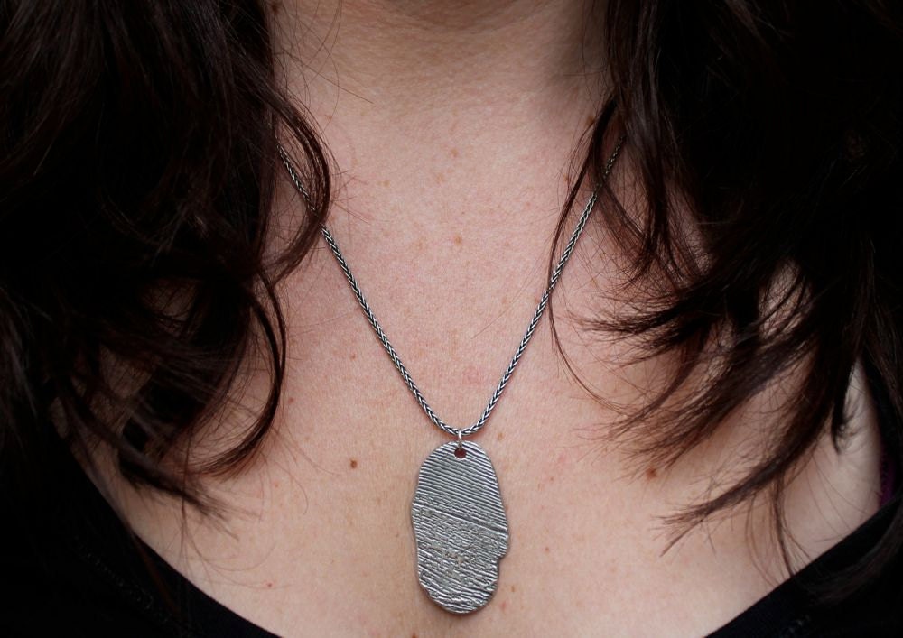 rumi quote necklace.  out beyond ideas there is a field meet you there engraved message necklace . sterling silver by peaces of indigo