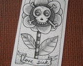 original pen and ink drawing of a skull flower by patti backer