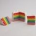 Miniature Rainbow Cake with Traditional Royal Icing