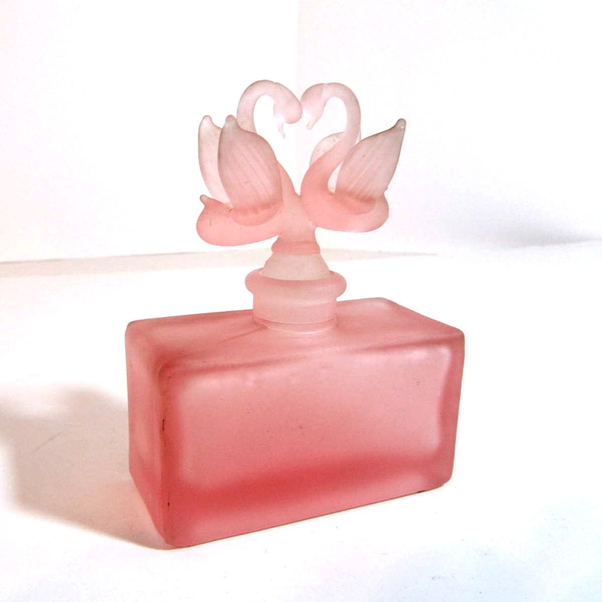 Antique pink satin glass perfume bottle swans