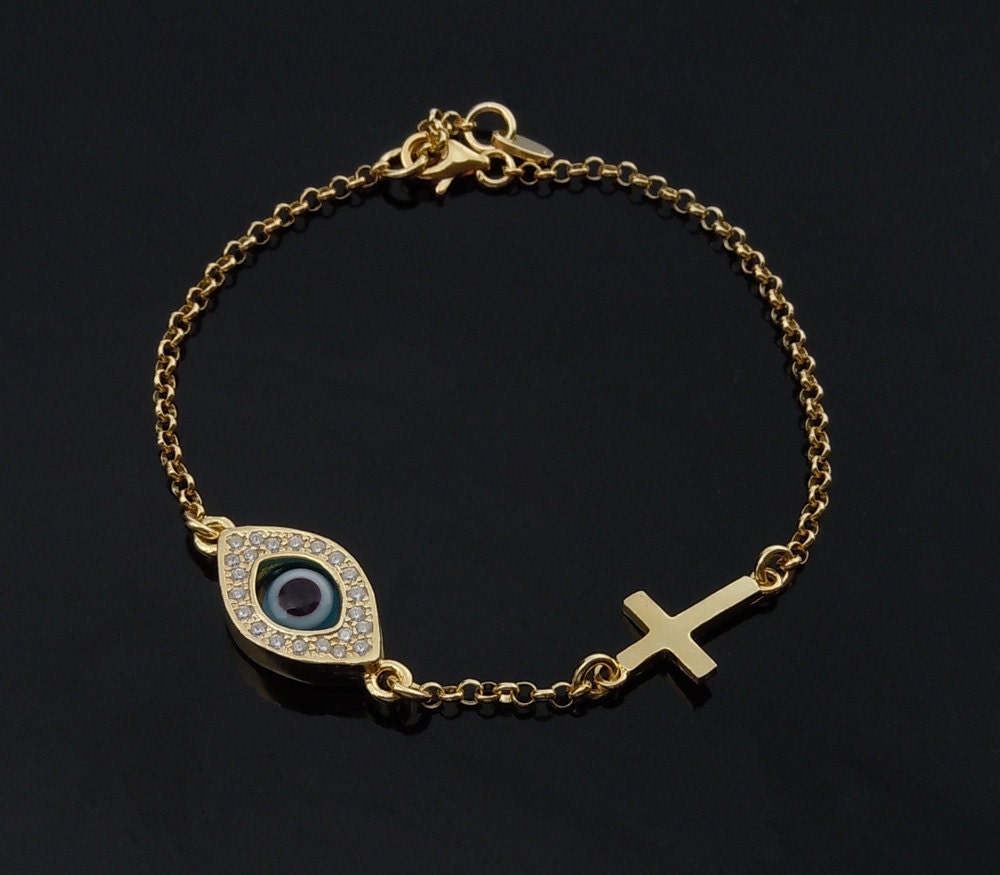 Celebrity Evil Eye and Cross Bracelet in Gold as Seen On Celebrities