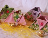Set of four floral small fabric baskets
