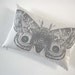 IO Moth silk screened cotton canvas throw pillow 12x18