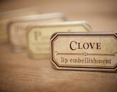 Clove -  lip embellishment in tin