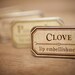 Clove -  lip embellishment in tin