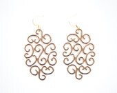 Cannes, France Earrings in Gold