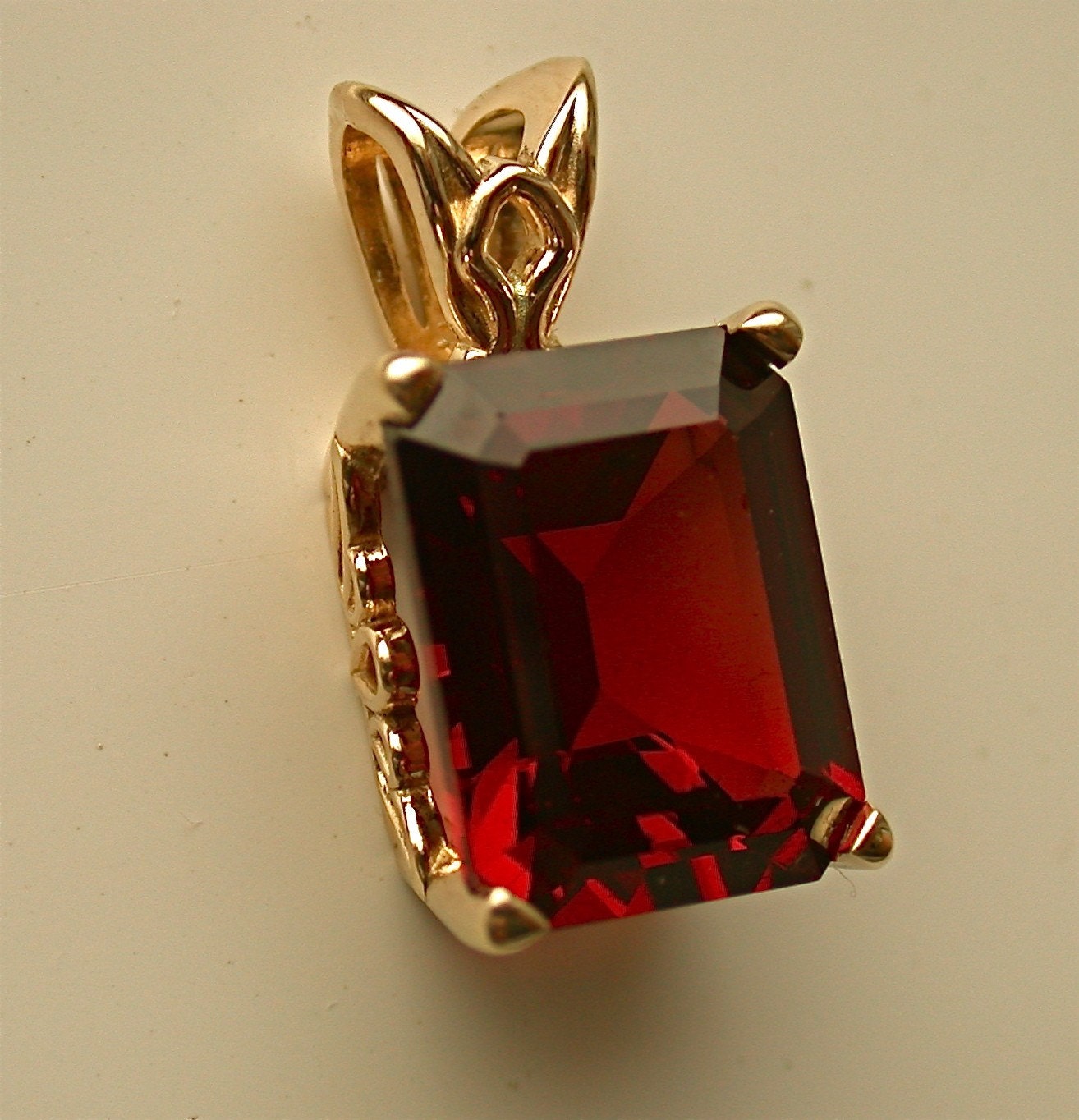 3 carat garnet pendant in 14k gold