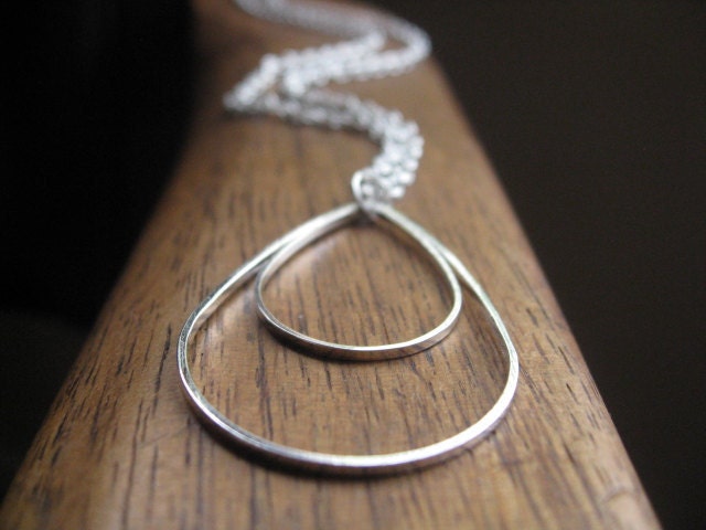 geometric silver necklace. modern necklace. rain drop necklace. splurge.