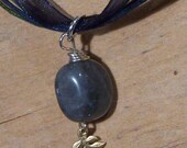 Tiny Treasures - labradorite and kyanite connected by a tiny leaf