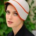Clementine- light gray cloche with orange trim