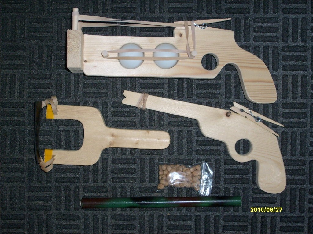 rubber band and a pea shooter 