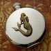 Round Mermaid Flask Hip Flask Silver & Brass Gothic Victorian Nautical Steampunk Pirate Accessories Featured on TheAwesomer dot com
