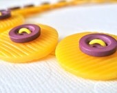 Button necklace, yellow and purple recycled buttons