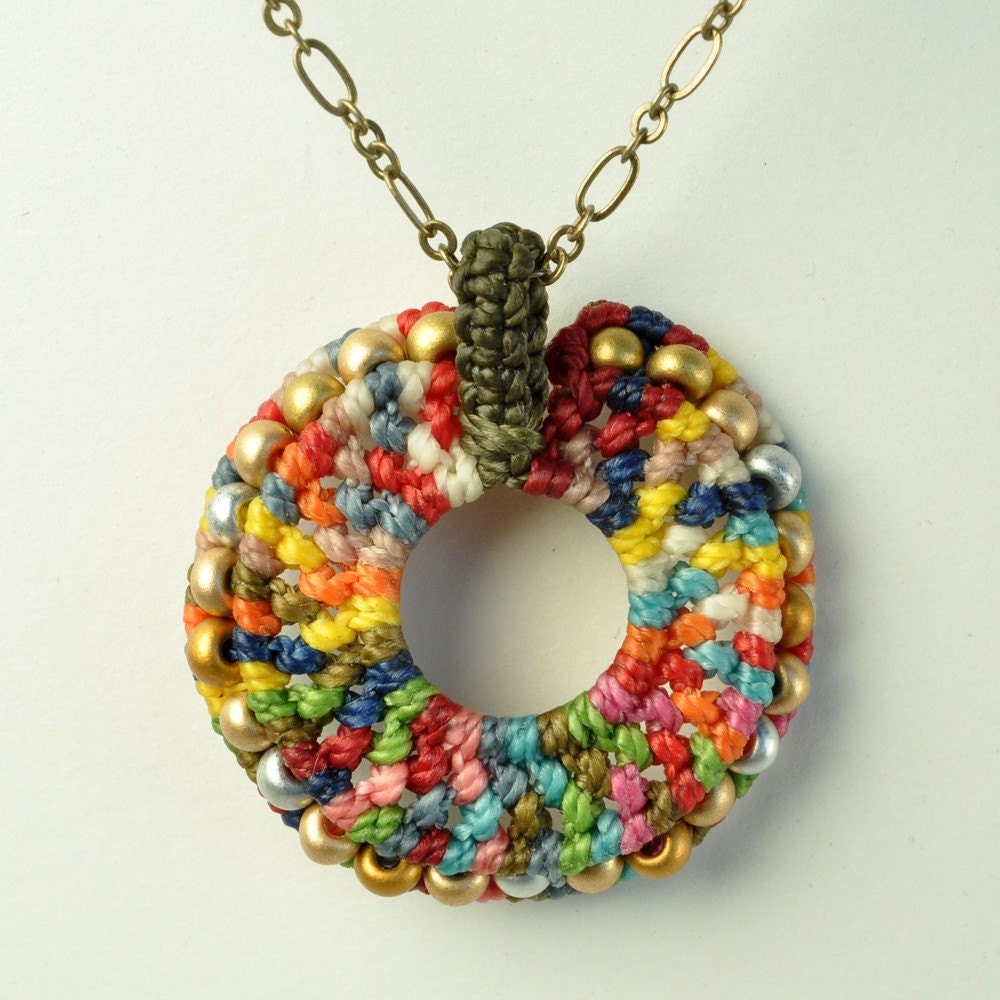 multicolor macrame circle pendant with beads