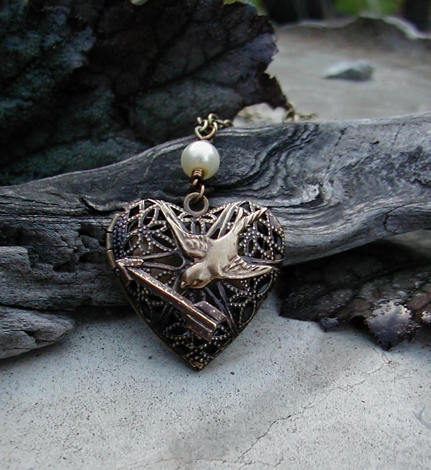 Hunger Games Inspired - The Love Locket with Peeta's Pearl and Arrow