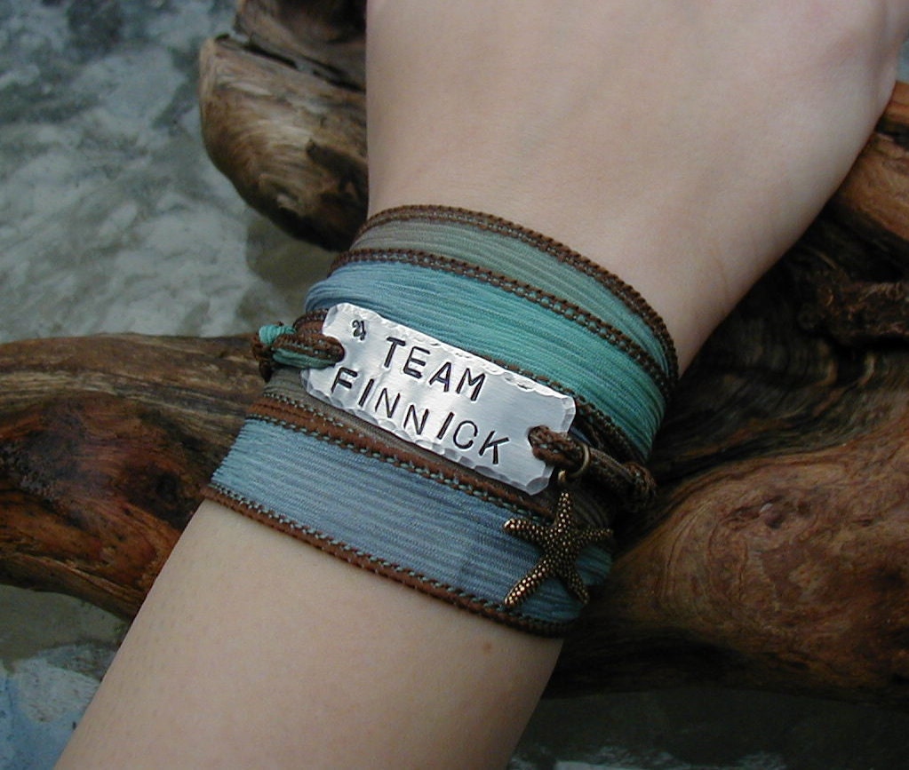 The Hunger Games Bracelet Wrap - TEAM FINNICK Hand Stamped  with Sea Foam Green/ Blue Silk Ribbon Wrap