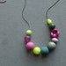 cyclamen necklace - vintage lucite and gunmetal