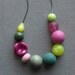 cyclamen necklace - vintage lucite and gunmetal