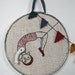 daring young girl on the flying trapeze- embroidery in red and charcoal
