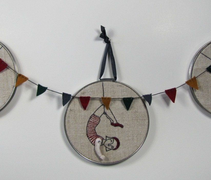 daring young girl on the flying trapeze- embroidery in red and charcoal