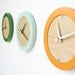 tangerine creamsicle modern wall clock