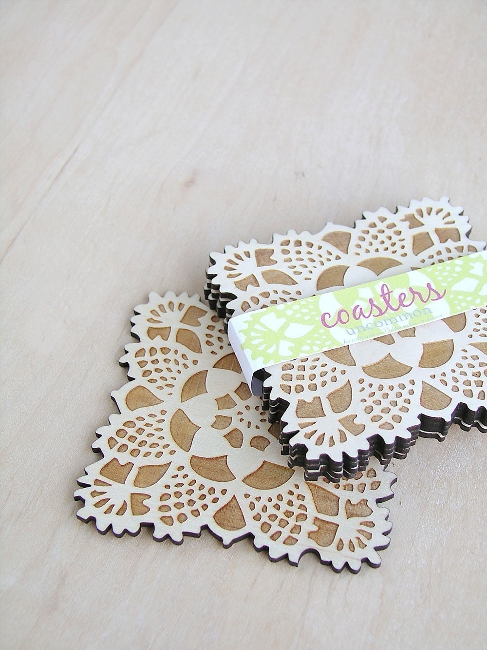 square doily coasters with natural woodgrain
