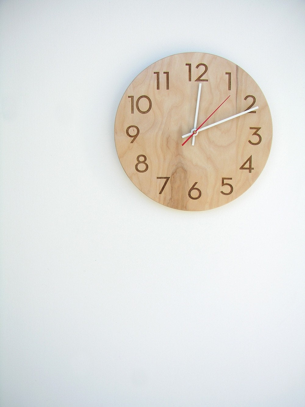 modern wood wall clock with beautiful natural woodgrain and classy modern numbers