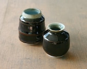 Pair of Wheel Thrown Porcelain small pots with blue interiors