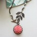 A Soft Coral Chrysanthemum, Dahlia Flower, Flying Bird, and Leaf Branch with Ivory Pearls Necklace. Gift Ideas for Bridesmaids.