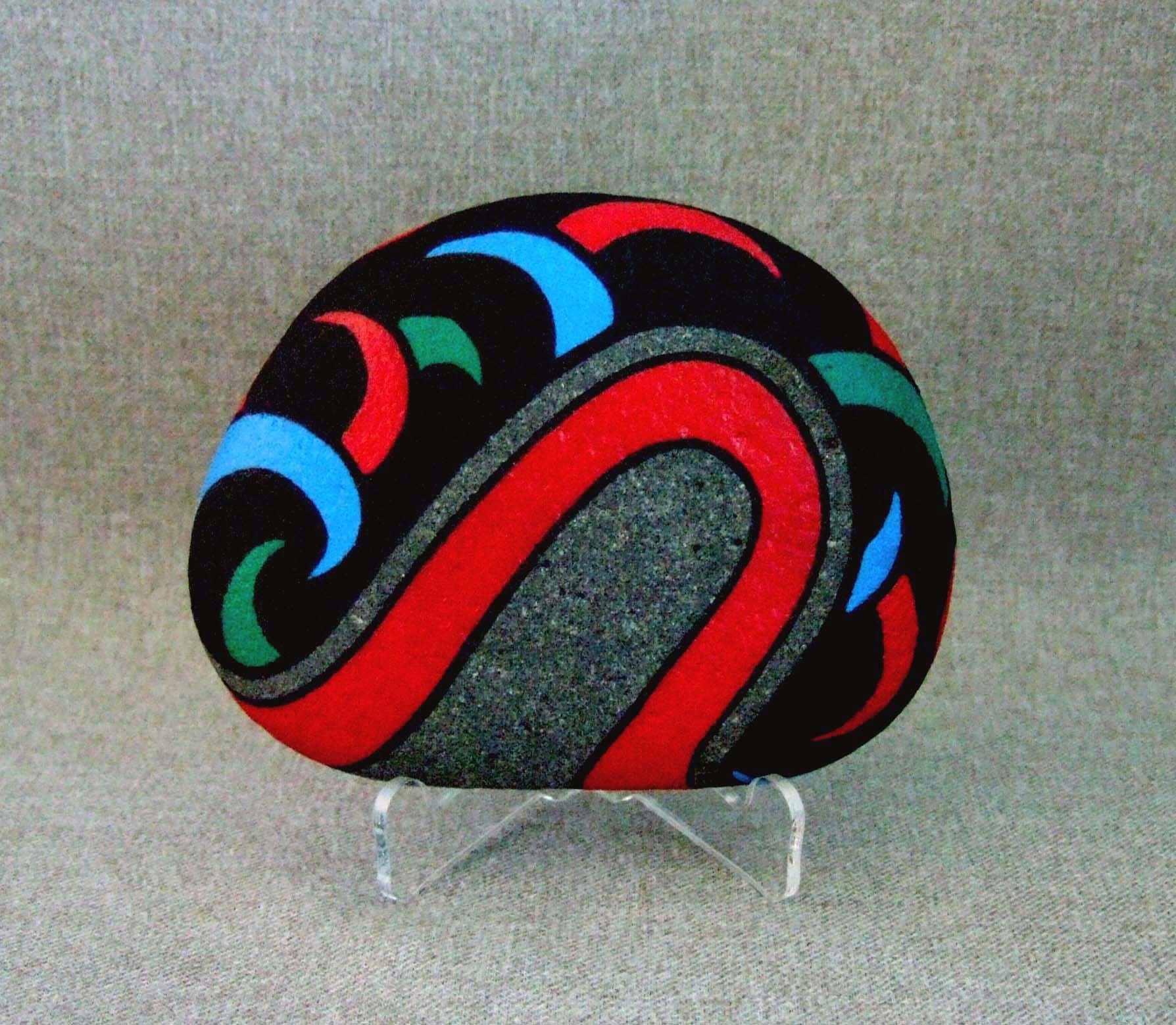 Unique Bearclaw Design Handpainted Rock, in Red, Blue, and Green on Black