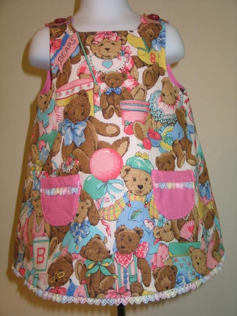 Blue bears Pink bears A lined jumper dress with Lace.