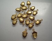 18 tiny brass acorn charms