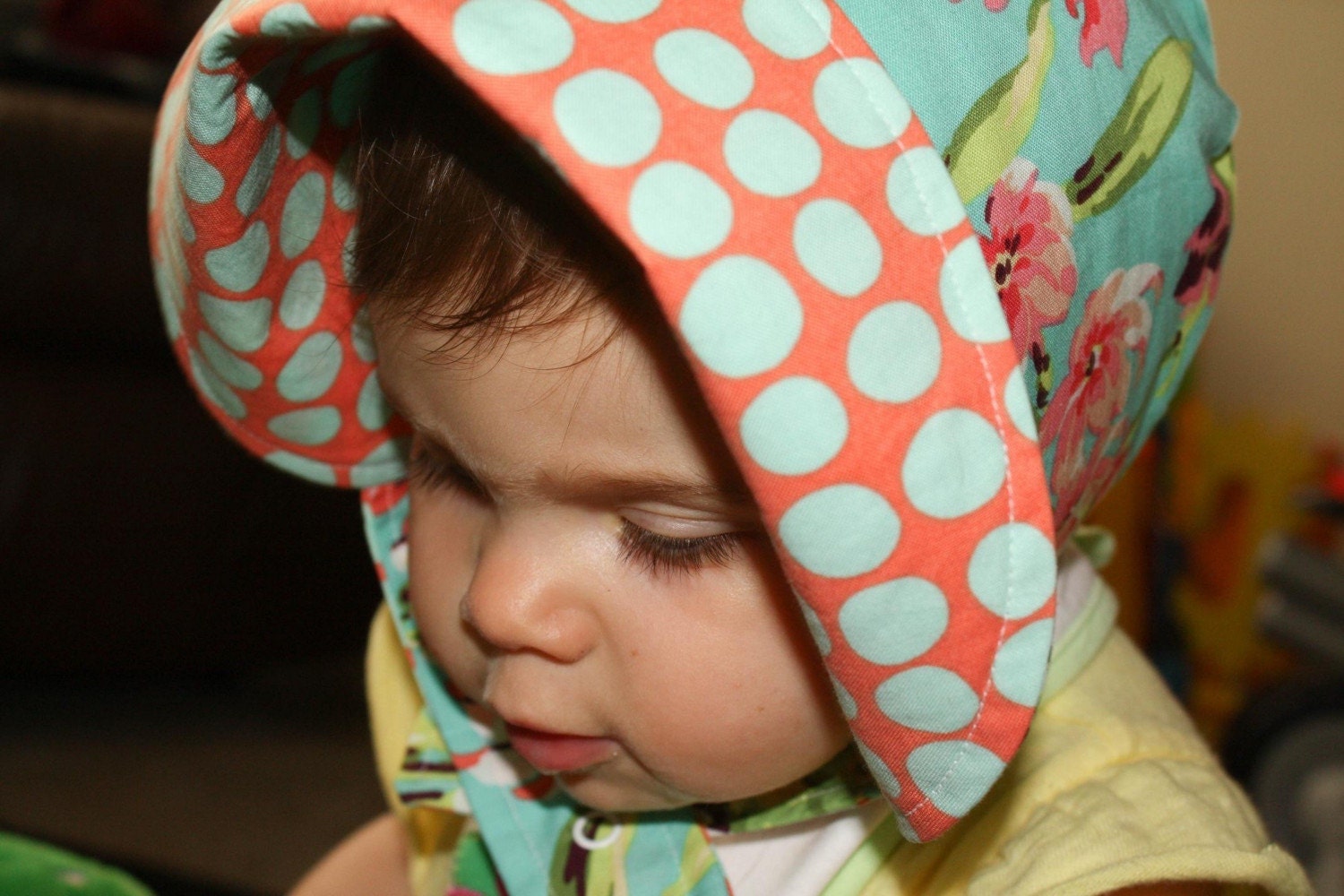 BLISSFUL BOUQUET, a reversible flip-me-back sun bonnet, in lush corals and aqua, from Bella Sol Bebe