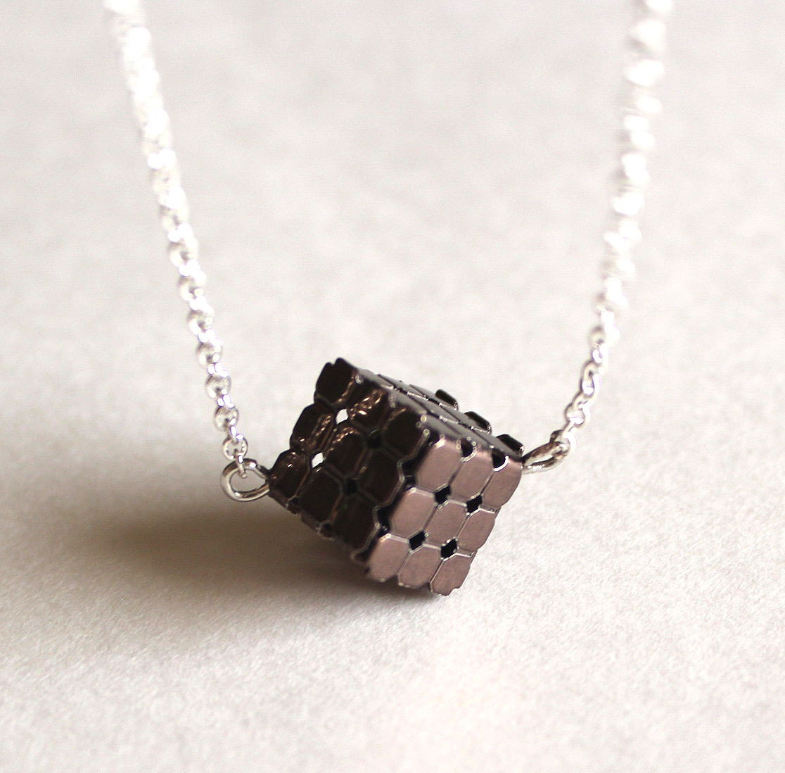 Rubiks necklace chocolate brown cube - Bunnys Rubiks necklace chocolate brown cube - Bunnys