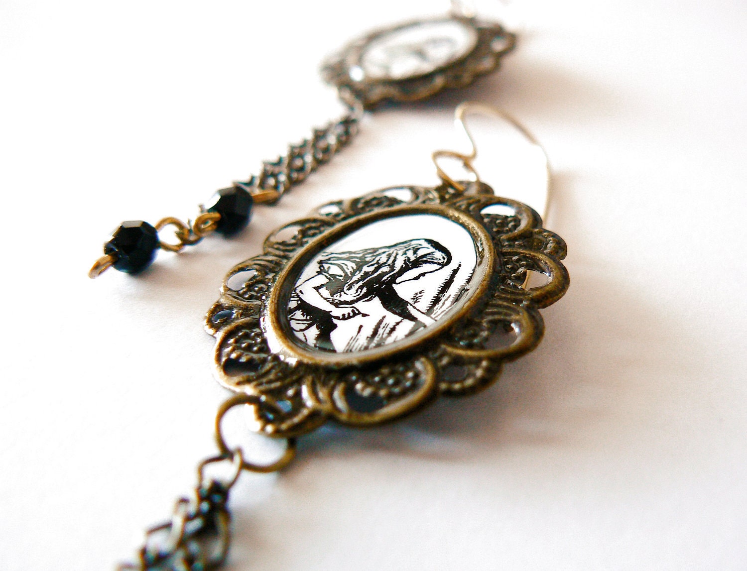 Alice in Wonderland earrings, antique brass and glass beads. Black and white. Long. Altered art. Pop culture. Curiosity.