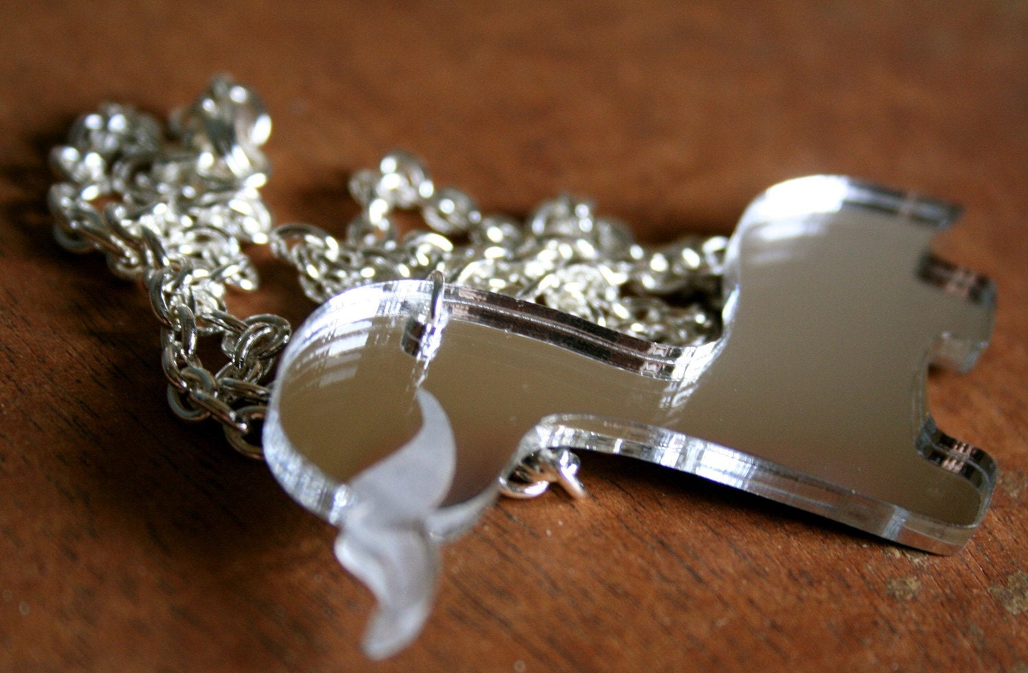 Mustachasaurus Silver Mirror Back Acrylic Necklace