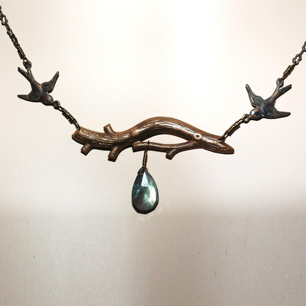 Rendezvous   ---   Two Birds Flying To Rendezvous On An Antiqued Vintaj Brass Branch Necklace With A Labradorite Teardrop - OnTheBead