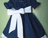 Girls dress in navy Blue dots with gorgeous eyelet trim and sash