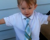 Boys neck tie in your choice of fabric and made to match her dress