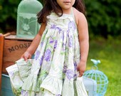 Summer halter dress with eyelet trim and double ruffle hem in violet and green