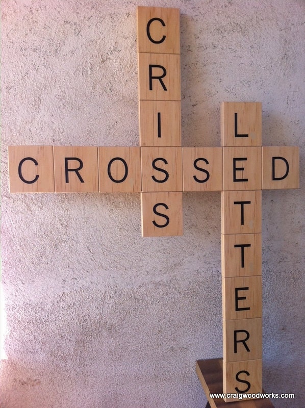 Large pieces of wood with letters on them