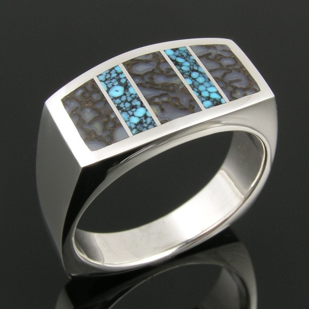 Dinosaur bone ring with spiderweb turquoise in sterling silver