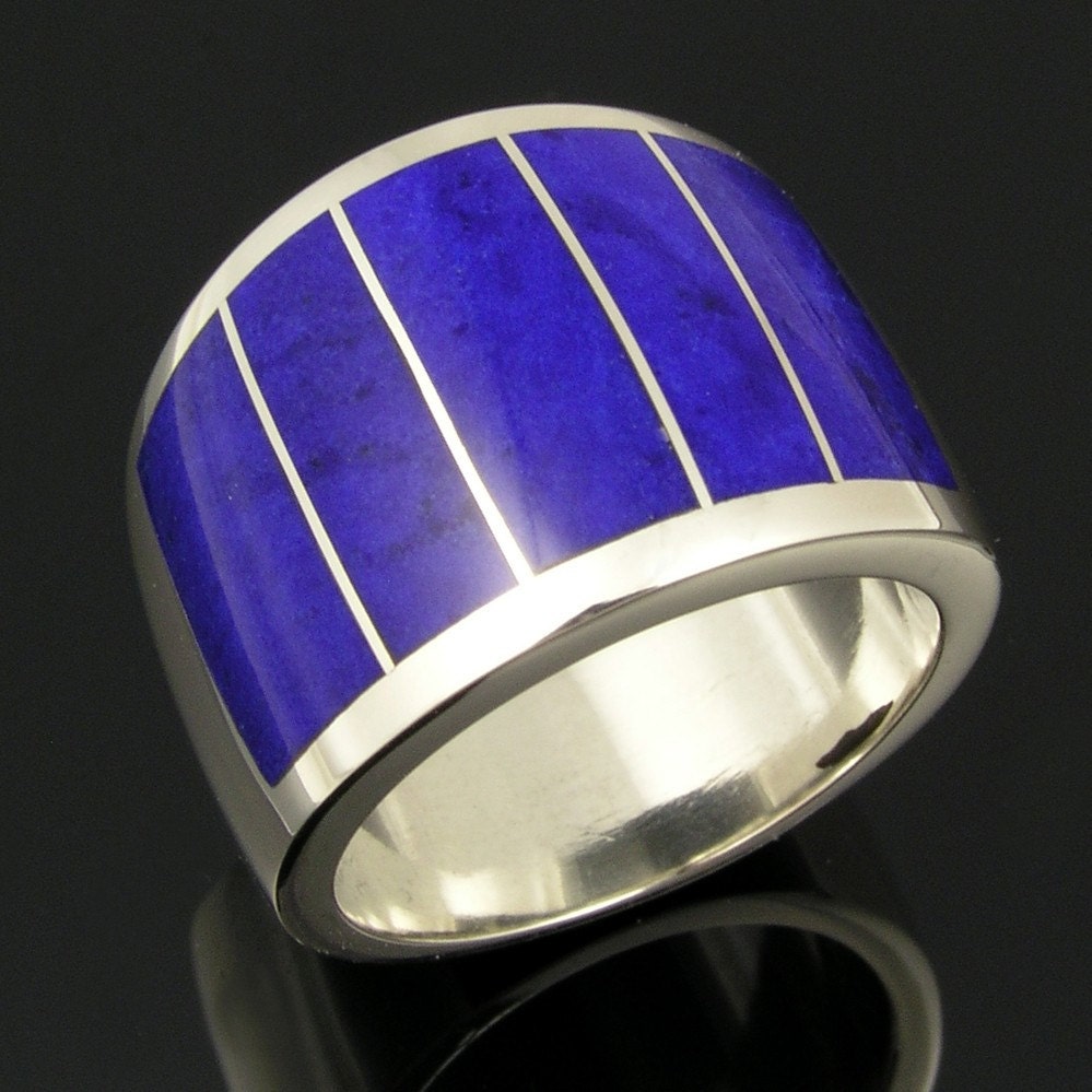 Wide sterling silver band inlaid with lapis by Mark Hileman.