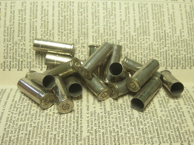 destash: 12 x silver shell bullet  case 38 special