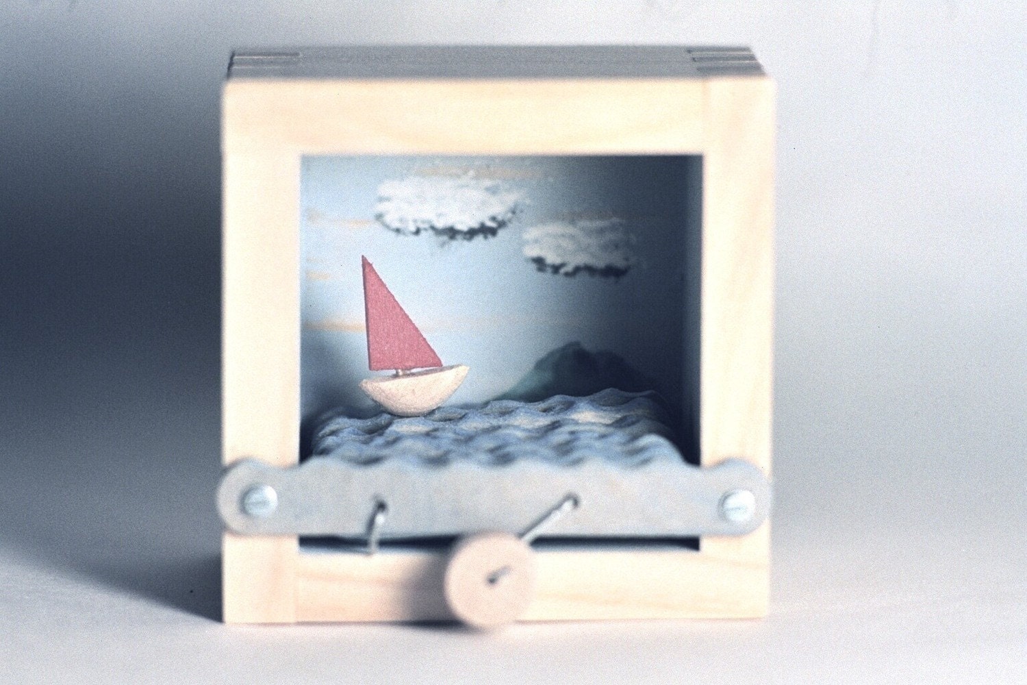 island scene sailboat automaton