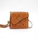 tooled leather bag. 1970s. shoulder purse