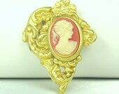 Plastic and Gold Tone Metal Cameo Brooch