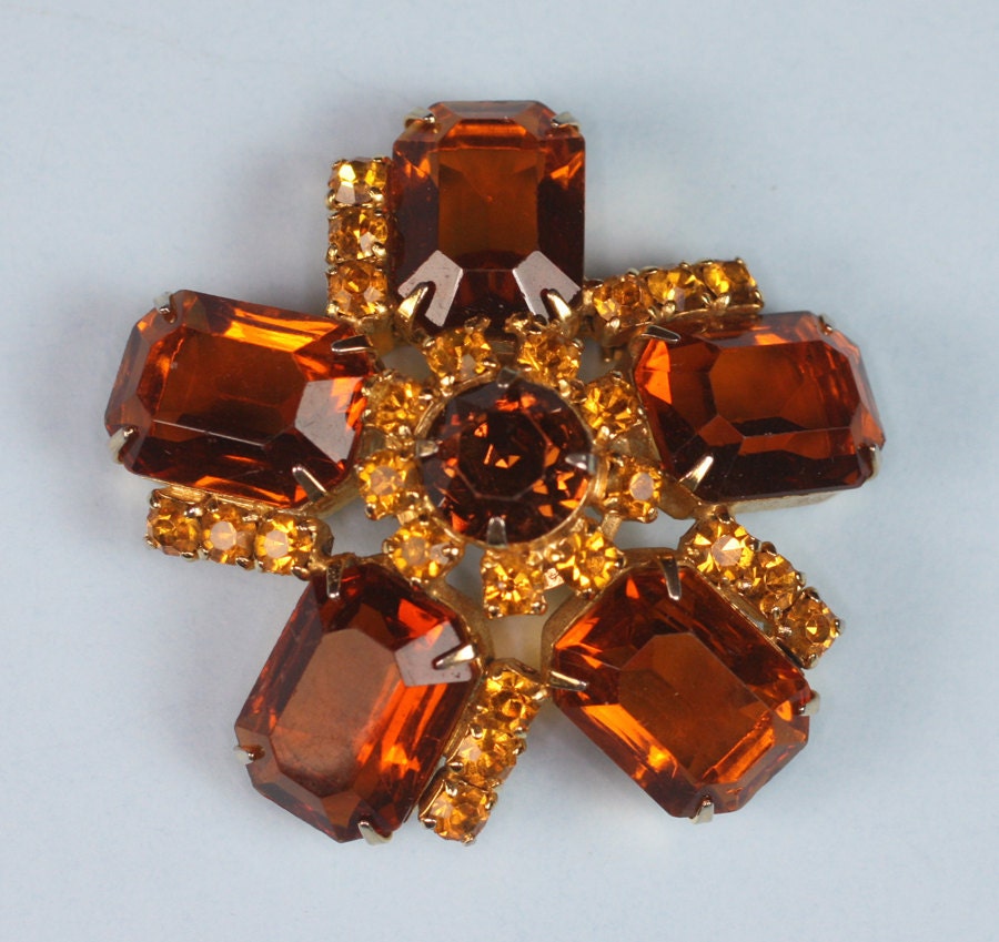 Vintage Rhinestone Brooch Topaz Glass Pinwheel Design