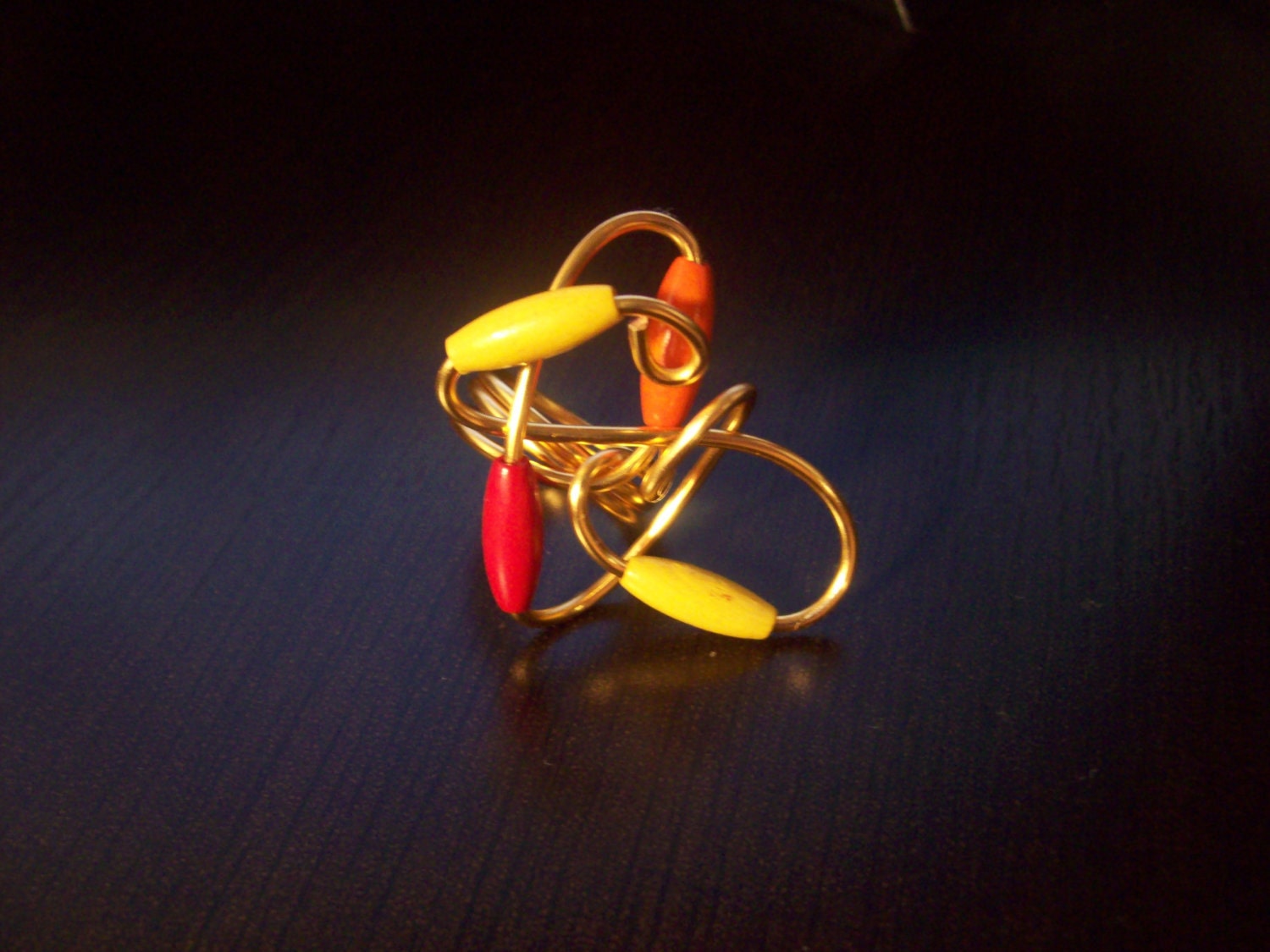 SALE Gold Swirl Ring w/wood beads