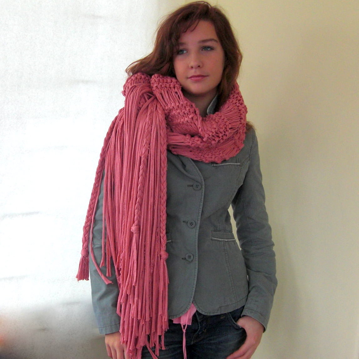 Big pink knitted scarf of eco T -yarn
